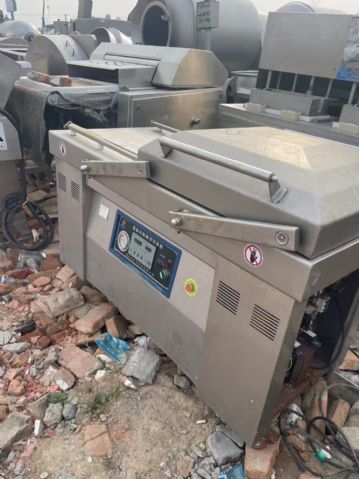 转让二手真空包装机 两台600型山东小康产自动摆臂