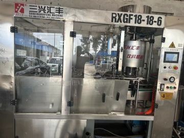 转让二手饮料罐装机 一台18头三合一饮料罐装机